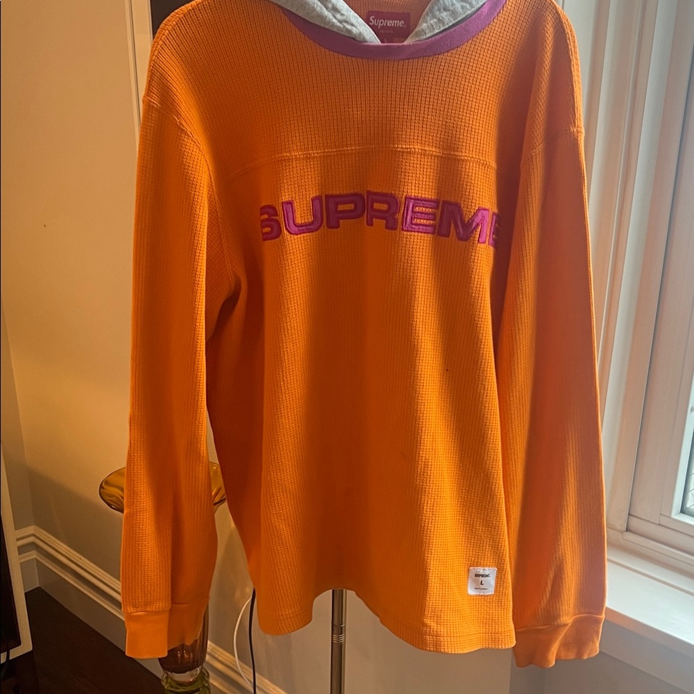 Supreme Orange Knit Top with Purple and Gray Accents